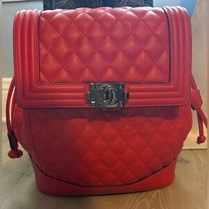 CHANEL Red Quilted Leather Backpack with CC Turn-Lock